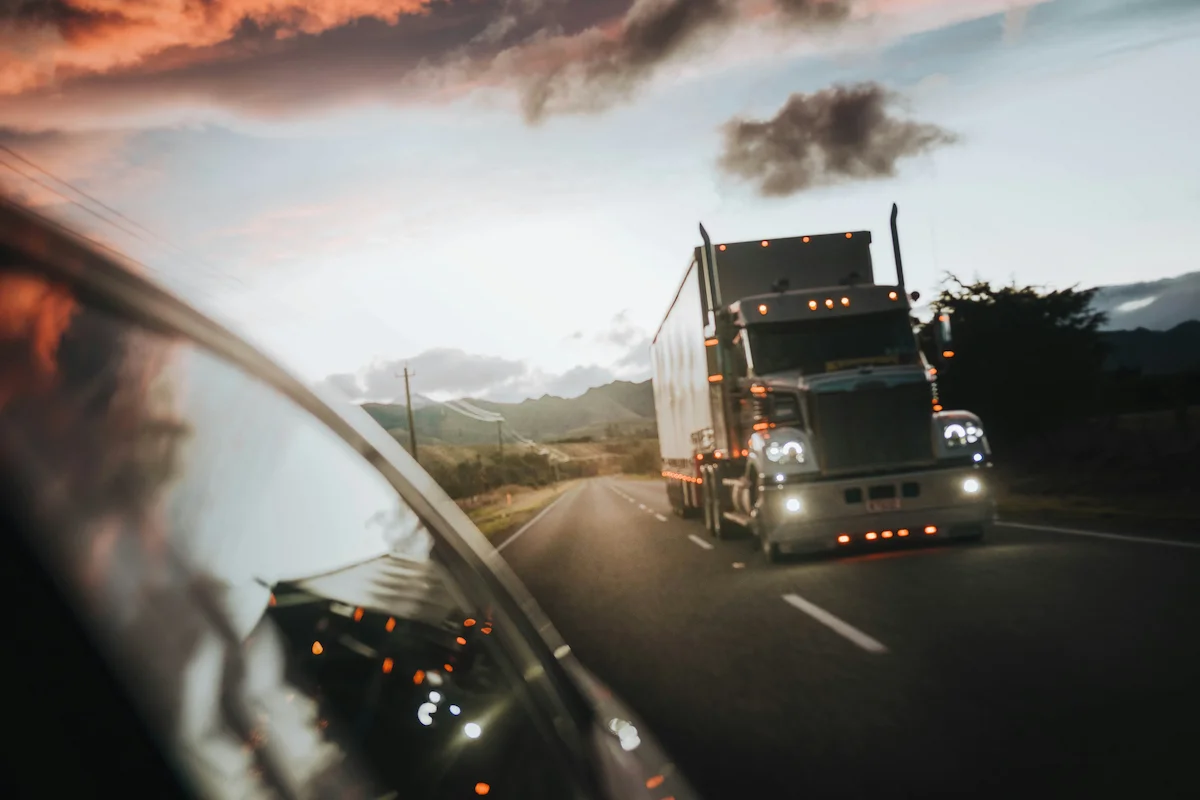 A heavy truck of a small motor carrier hauling a load with a reefer trailer